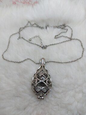 Waterdrop-shape Hollowed-out Pendant with Aroma Ball Pelelith Necklace